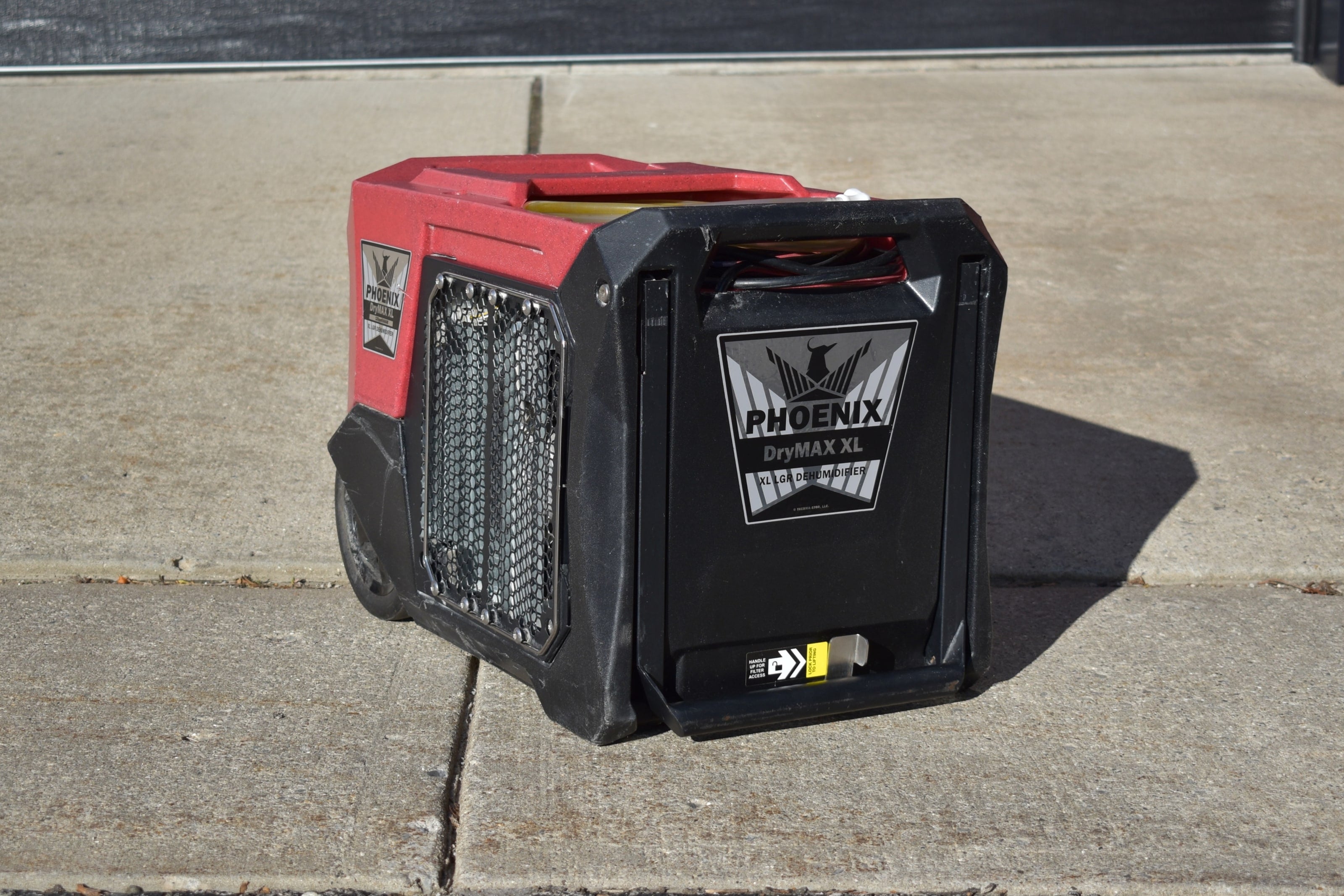 A Phoenix DryMAX XL dehumidifier outside the Bay Area Clean Care shop
