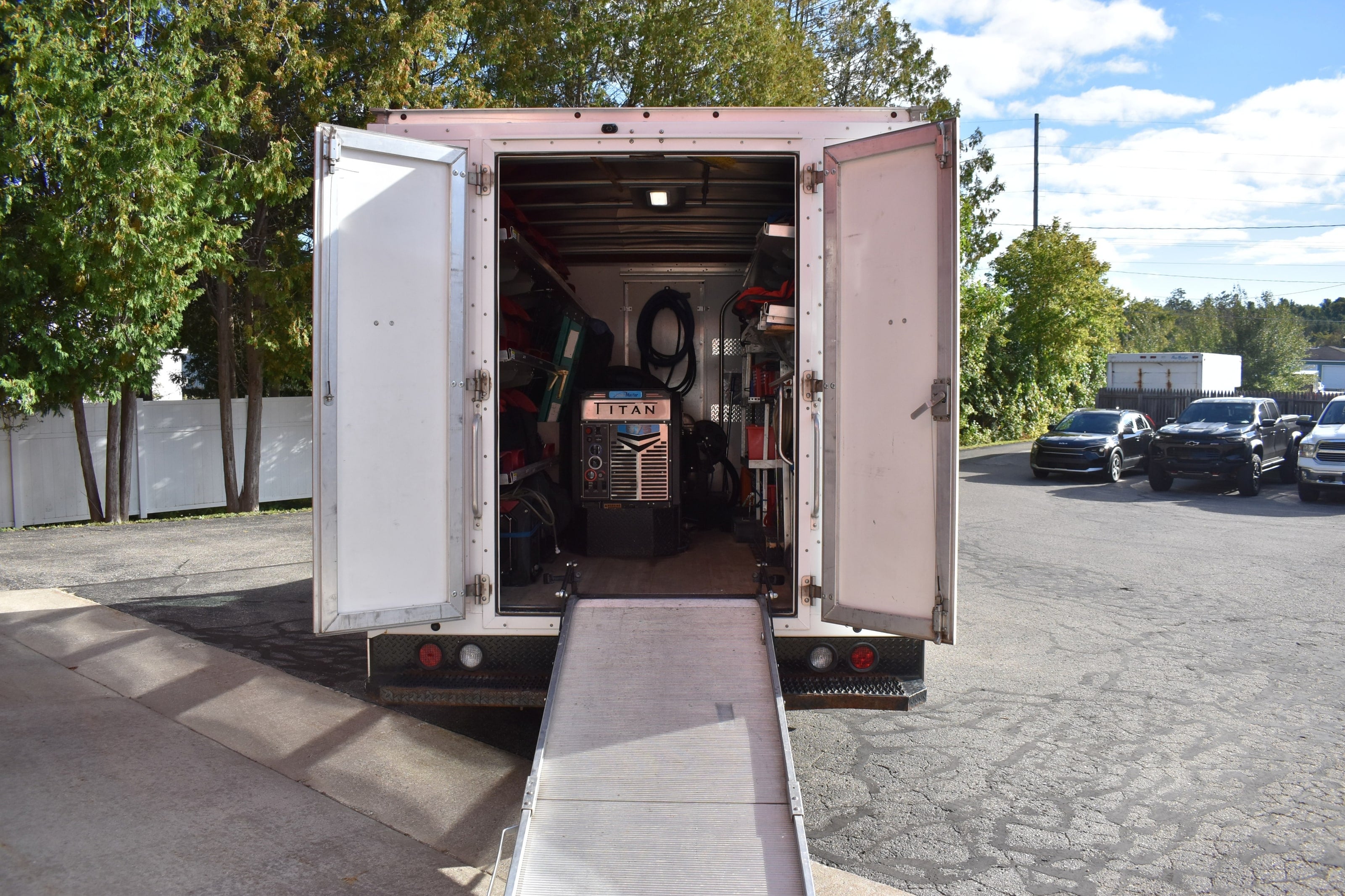 The Bay Area Clean Care restoration truck with its ramp down and drying equipment loaded